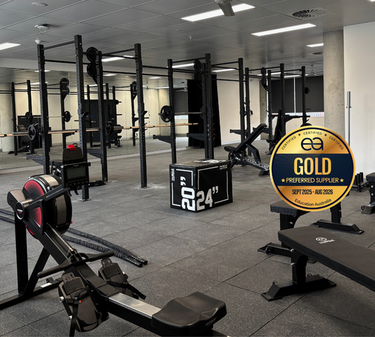 Gym interior with equipment and a Gold's Gym logo.